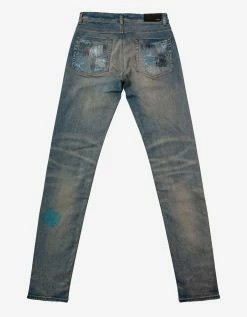 Amiri Clothing All Over Repair Clay Indigo Jeans