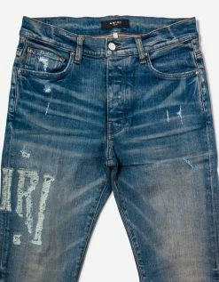 Amiri Blue Distressed Logo Jeans