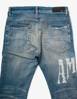 Amiri Blue Distressed Logo Jeans