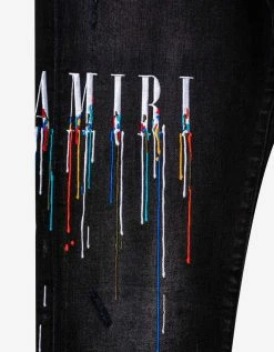 Amiri Clothing Paint Drip Logo Aged Black Jeans